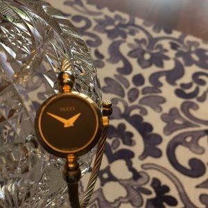 Gucci gold plated cable band watch